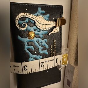 Kate spade mini wallet pic/ video for more details of this item